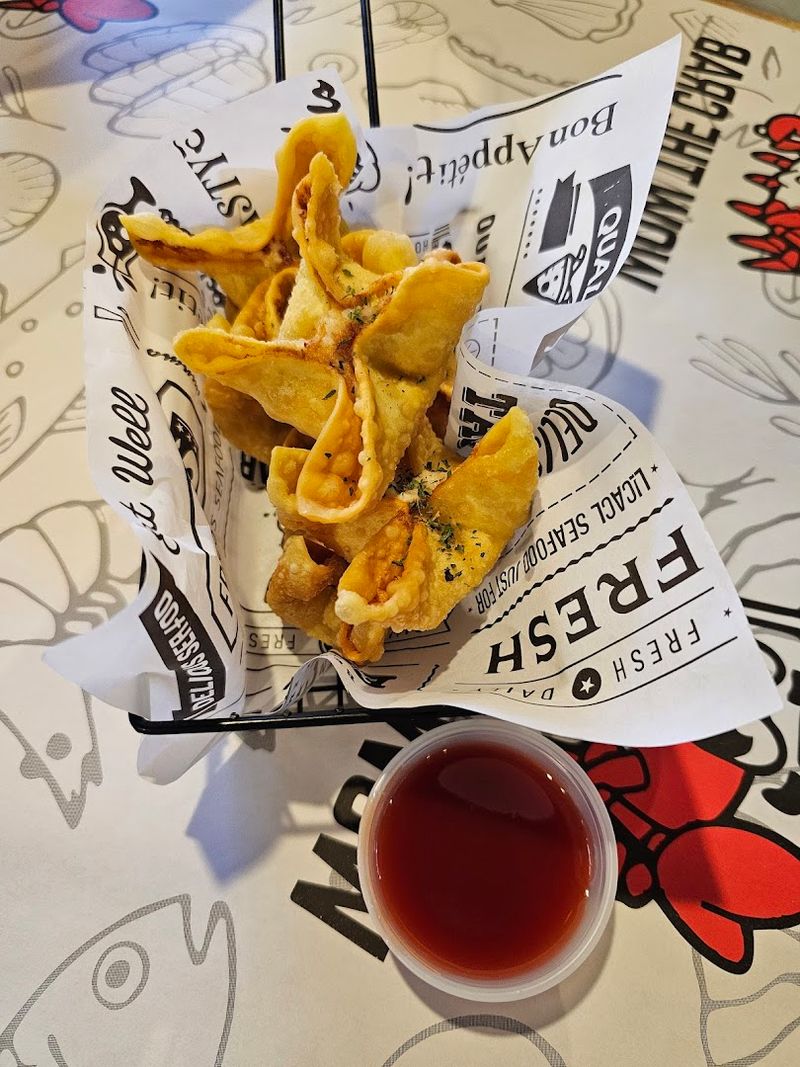 The Fried Calamari and Crab Puffs Worth Ordering First The Fried Calamari and Crab Puffs Worth Ordering First