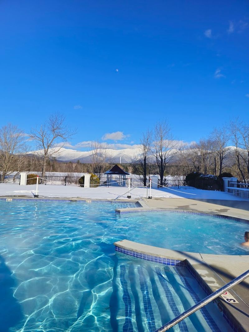 The Outdoor Heated Pool With Mountain Views