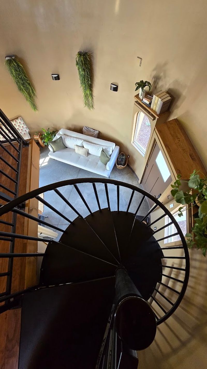 The Spiral Staircase And Loft Make It Feel Playful