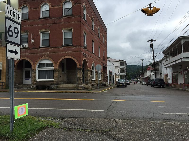 Weathered Porch Rails and Late 19th-Century Buildings Weathered Porch Rails and Late 19th-Century Buildings
