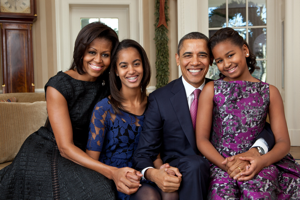 Personal memorabilia and official White House business fill Chicago's newest attraction. Photo of Obama family from 2011, c. Obama Presidential Library. 