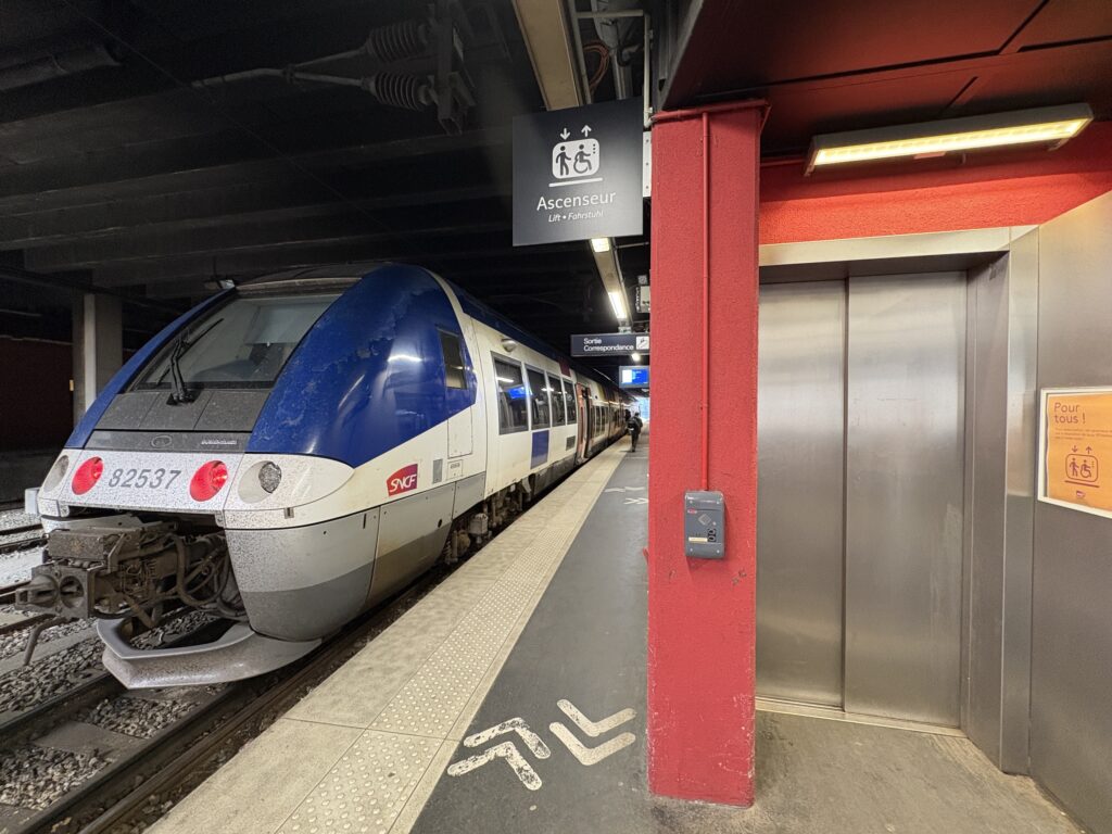 Most European train stations have elevator and / or escalator access to train platforms.