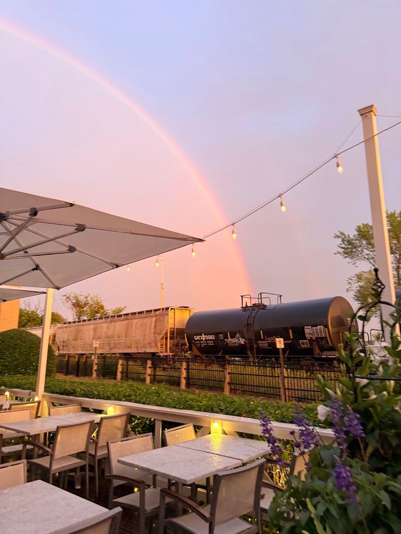 Patio Dining With Boats, Trains, and Pure Lake Energy