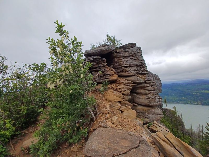Rocky Outcrops and Trail Navigation Near the Top