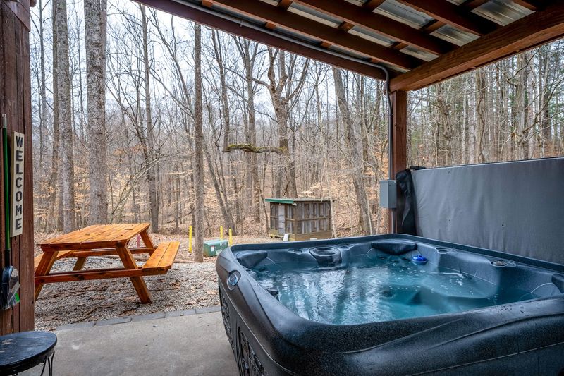 Soak In A Hot Tub With A Forest View
