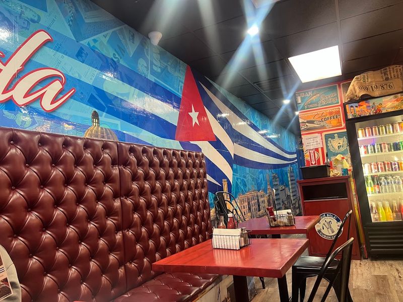 The Atmosphere Inside Que Bola Cuban Cafe Feels Like a Genuine Escape