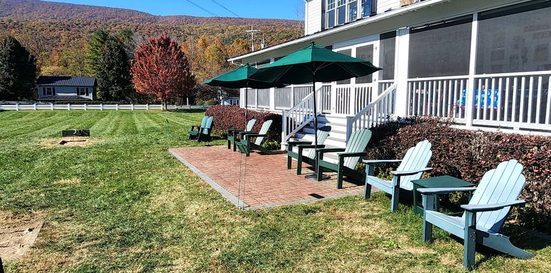 The Screened-In Back Porch With Mill Views