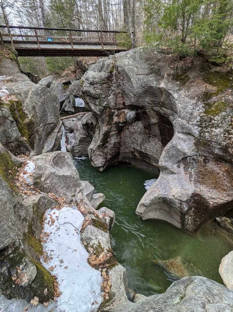 Walking Directly Over the Gorge on the Wooden Footbridge