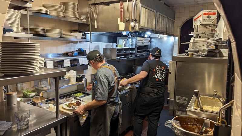 Walking Through the Kitchen Is Part of the Experience Walking Through the Kitchen Is Part of the Experience