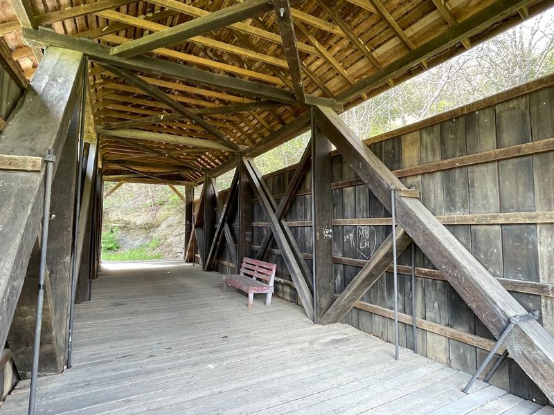 A Pedestrian-Only Span With Antique Cars Displayed Inside