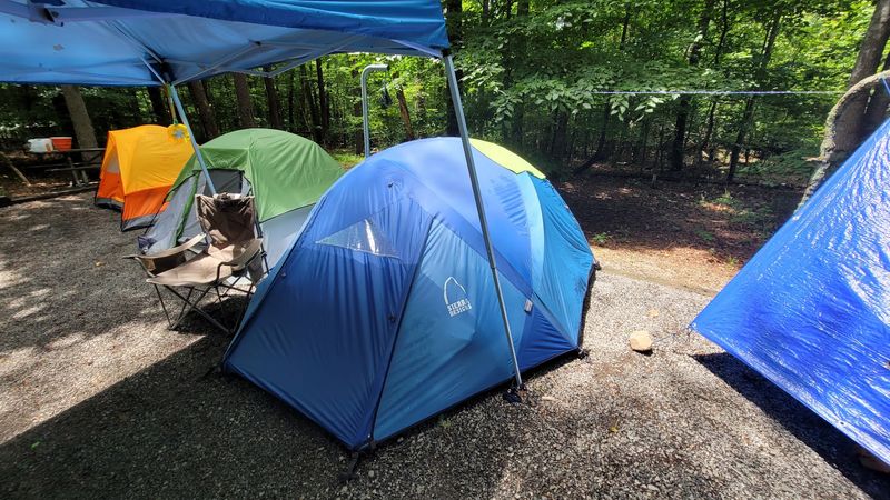 Camping Under Stars With a Lake Right Outside Your Tent