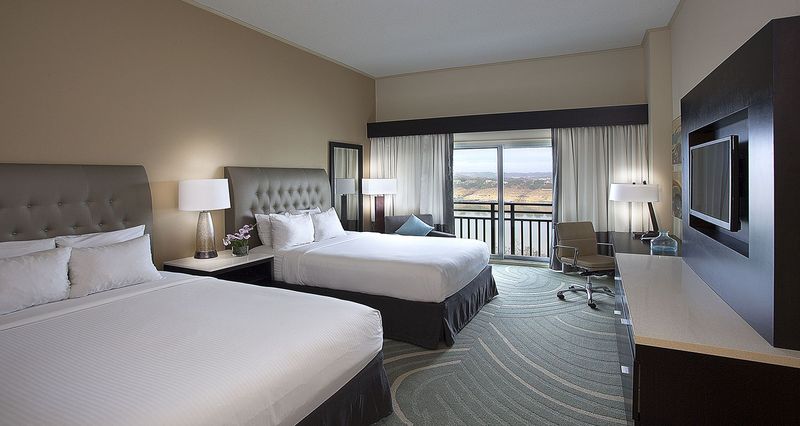 Elegant Rooms and Suites with Lake Travis as Your Backdrop