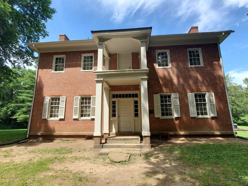 Make Time for the Historic Lusk Home and Richard Lieber Log Cabin