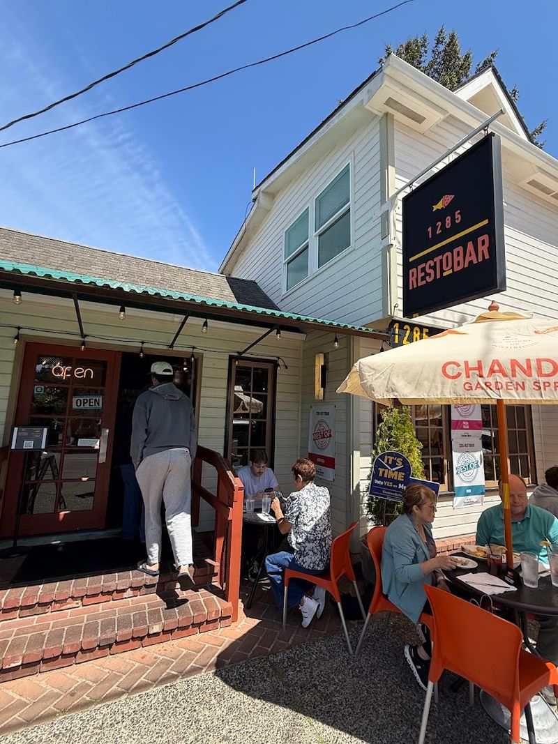 Outdoor Patio Seating With a Lively Street Energy Outdoor Patio Seating With a Lively Street Energy
