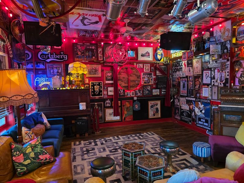 Red Walls, Wild Art, and a Room That Tells Its Own Story Red Walls, Wild Art, and a Room That Tells Its Own Story