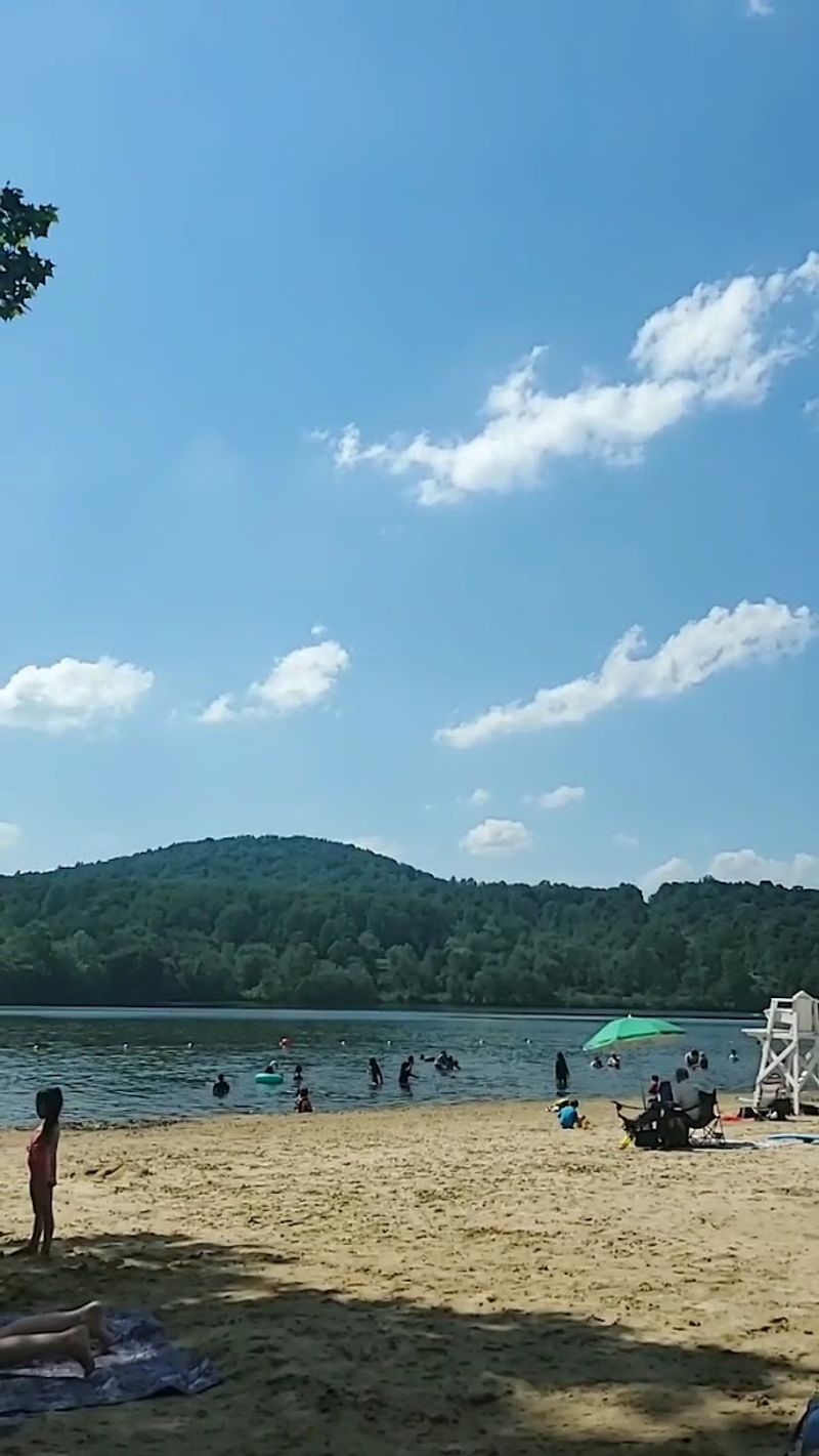 Sandy Beach, Lifeguards, And A Concession Stand For Families