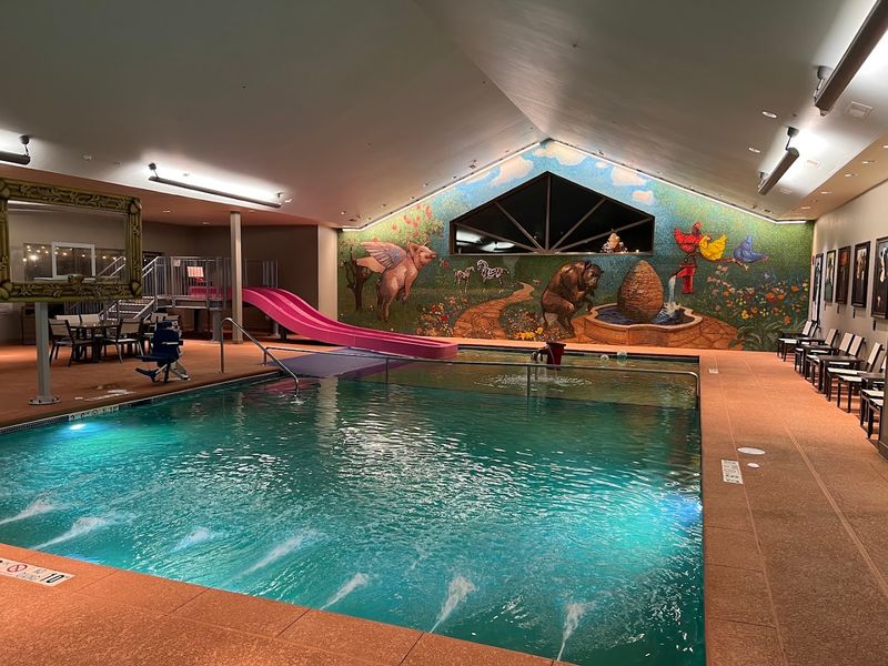 Splash Down a Cow-Tongue Slide in the Indoor Pool Area Splash Down a Cow-Tongue Slide in the Indoor Pool Area