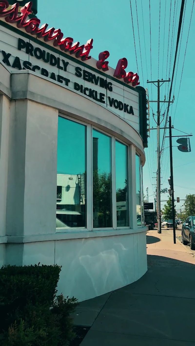 That Neon Marquee Still Stops You