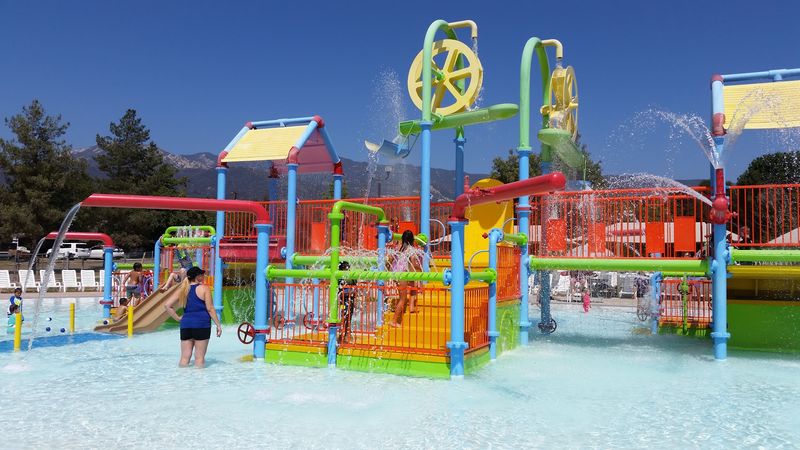 The Aquatic Play Structure, Slides, Dumping Buckets, and Endless Splashing The Aquatic Play Structure, Slides, Dumping Buckets, and Endless Splashing