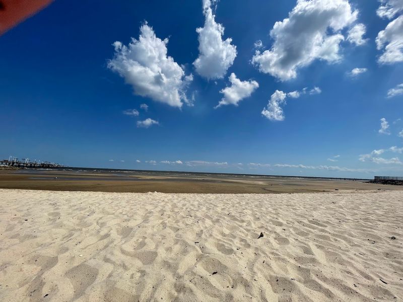 The Beach Itself: Soft Sand, Shallow Water, and Real Calm The Beach Itself: Soft Sand, Shallow Water, and Real Calm