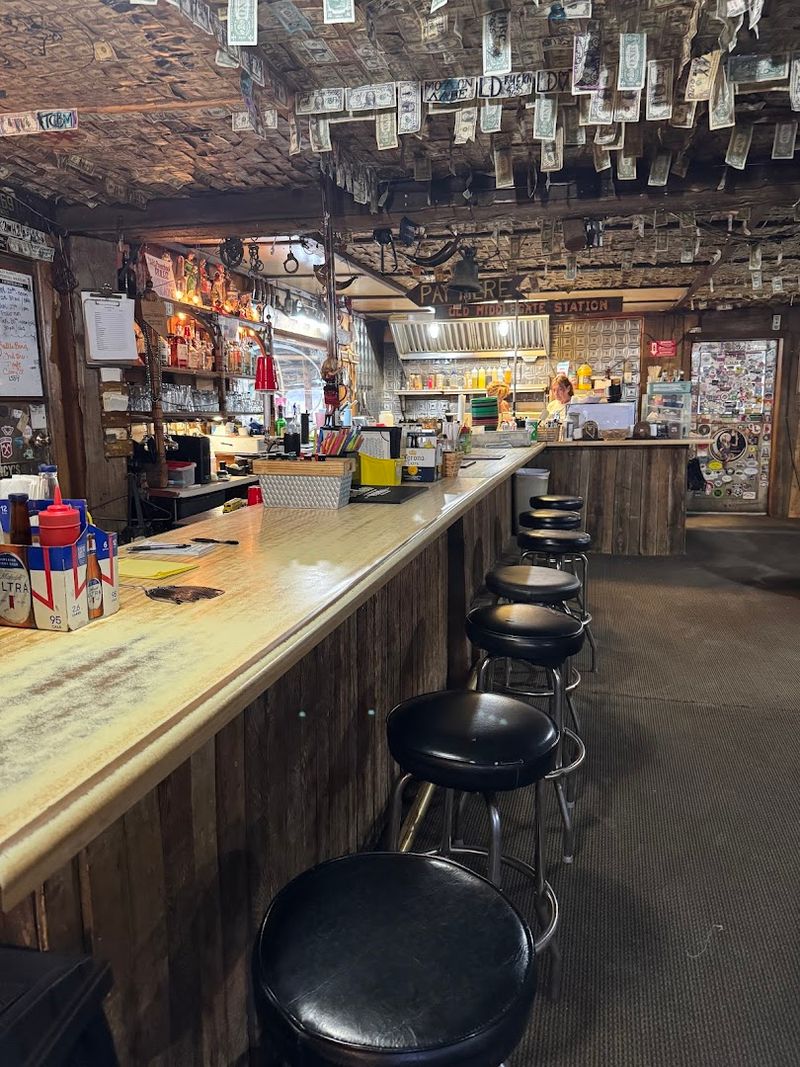 The Dollar Bill Ceiling and Walls That Tell a Thousand Stories