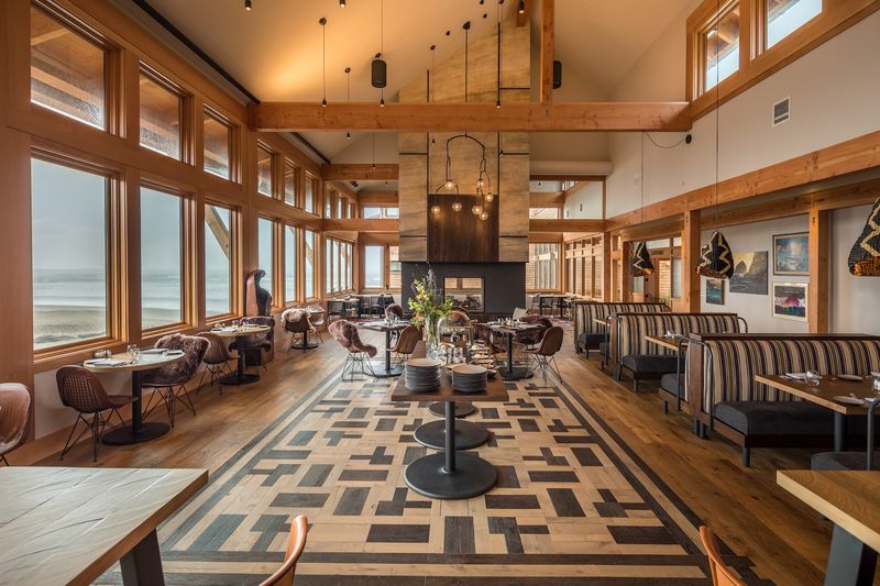 The On-Site Restaurant With Fireplace and Beach Views