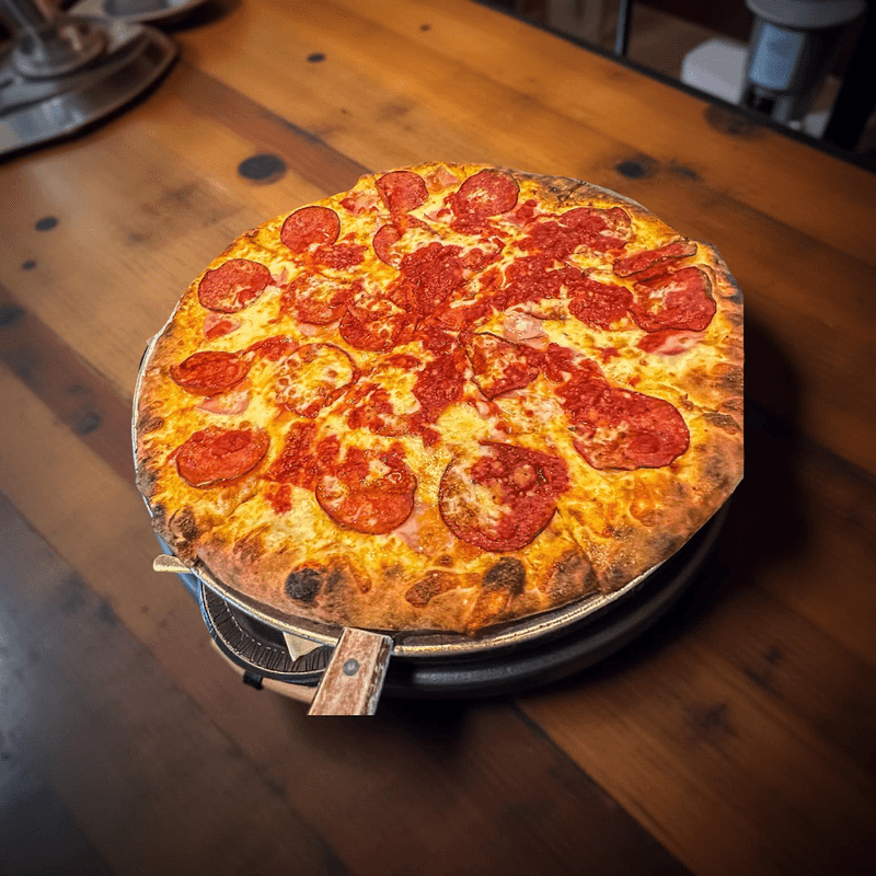 Wood-Fired Brick Oven Pizza With Roots in New York Tradition Wood-Fired Brick Oven Pizza With Roots in New York Tradition