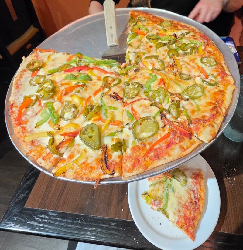Wood-Fired Pizzas That Keep People Coming Back Wood-Fired Pizzas That Keep People Coming Back
