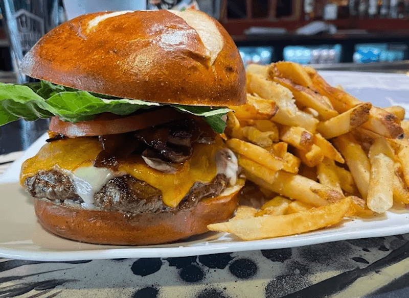 You’ll Need Both Hands And A Big Appetite For These Legendary Burgers