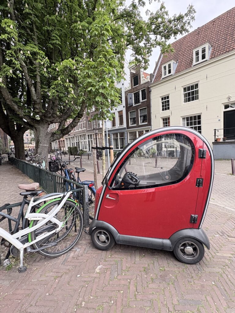Single driver cars and bikes are widely seen in this environmentally aware city.