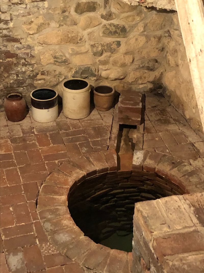 A Basement Kitchen and Indoor Well That Solved a Dangerous Problem