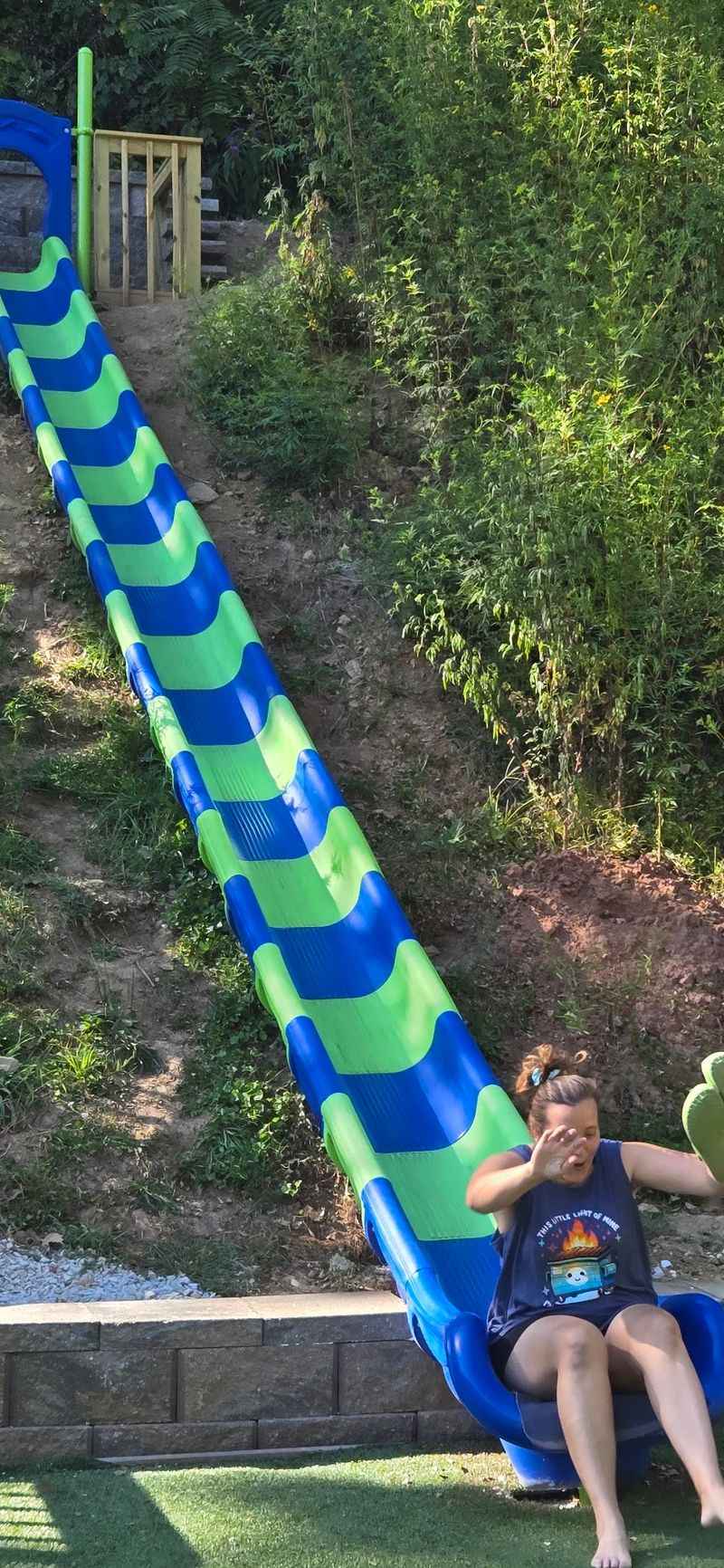 A Forty Foot Hillside Slide On Astroturf