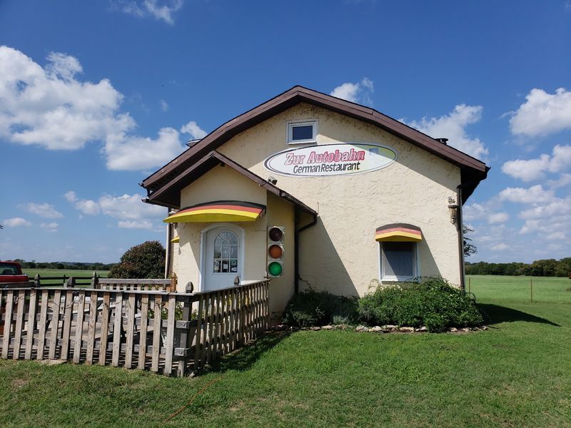 A Stucco Building Wearing The German Colors