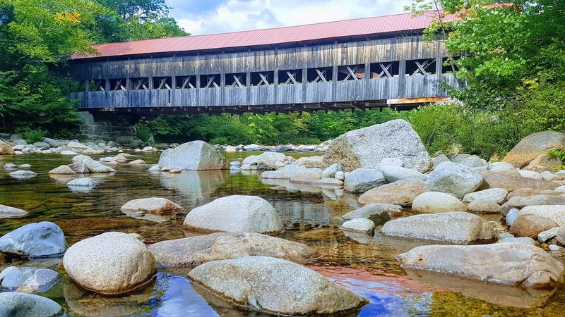 A Timeless Wooden Wonder Above the Swift River A Timeless Wooden Wonder Above the Swift River