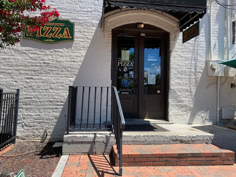 A White Brick Storefront That Barely Announces Itself