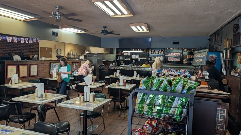 Cafeteria Trays, Pig Figurines, And Zero Pretense