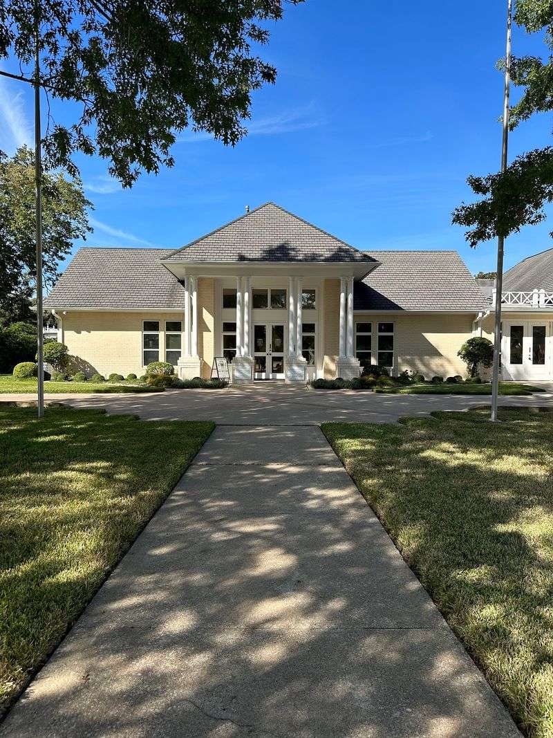 Carriage House With A Gymnasium And Horse Stalls
