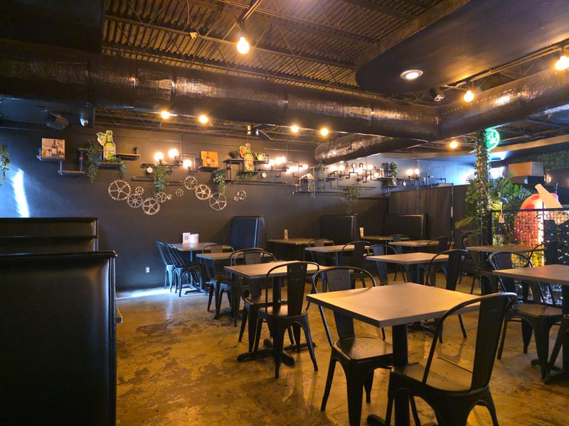Dim Lighting, Dark Wood, and a Room That Feels Like a Weekend