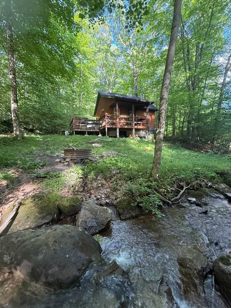 Eight Secluded Cabins, One Quiet Creek Eight Secluded Cabins, One Quiet Creek