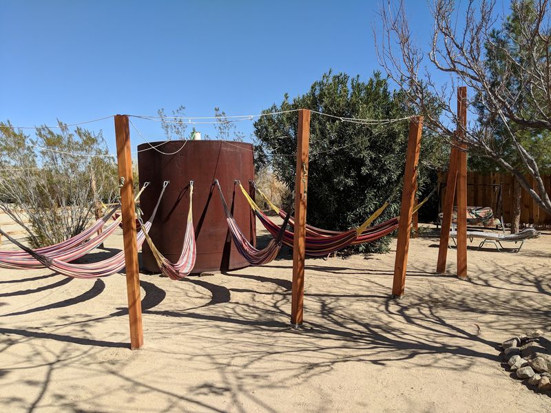 Hammocks, Courtyard Shade and the Wall of Visitors