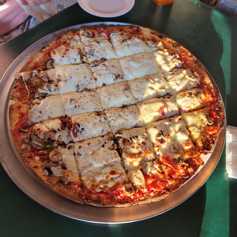 Hand-Tossed Pizza And Wings That Locals Order On Repeat