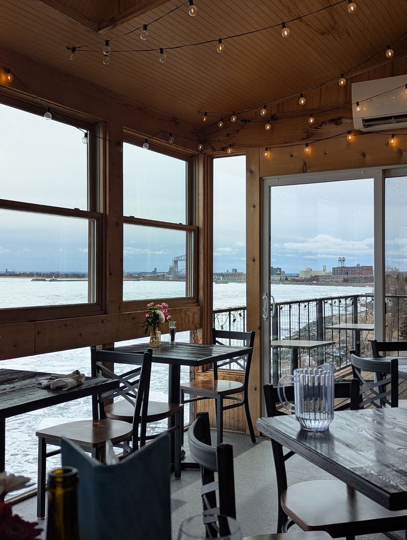 Inside The Solarium, Where Glass Frames The Whole Lake