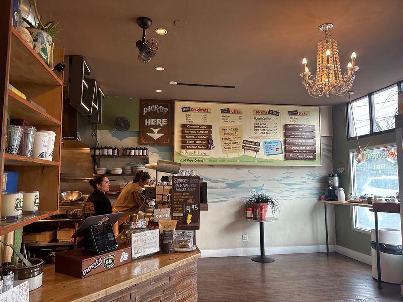 Inside The Space, Hand Painted Signs And Warm Wood Inside The Space, Hand Painted Signs And Warm Wood