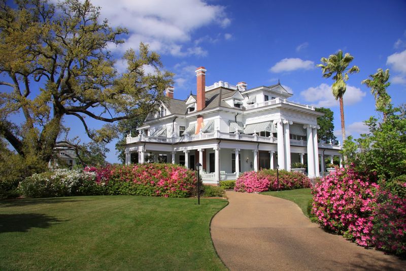 Lawns, Flower Beds, And Roses On A Full City Block