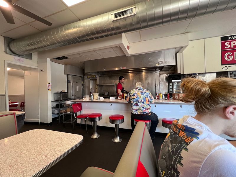 Red Vinyl Stools And A Counter That Never Changed