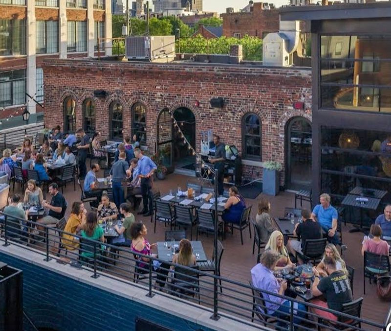 Rooftop Seating With Downtown In View