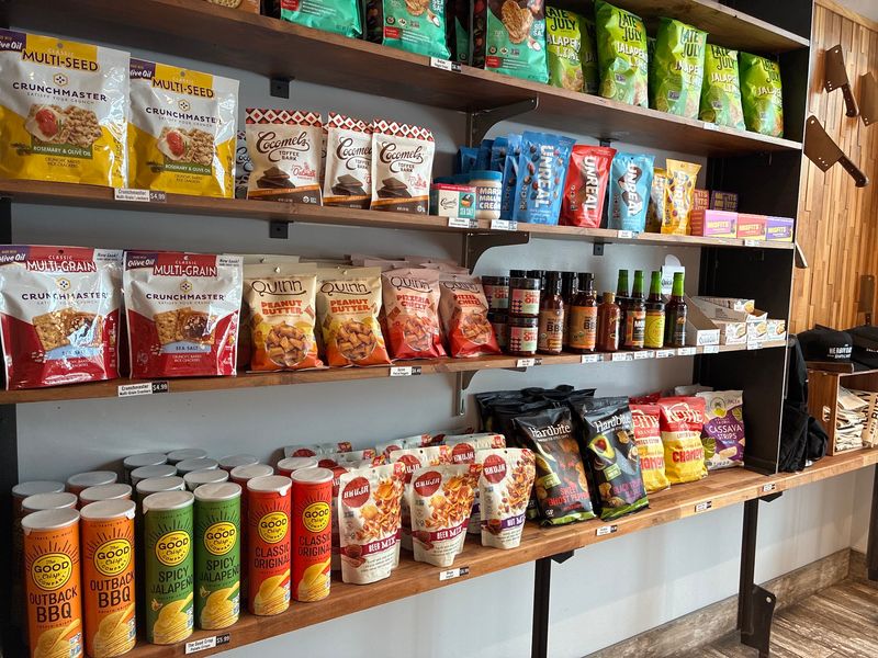 Shelves Full of Extras Beyond the Counter
