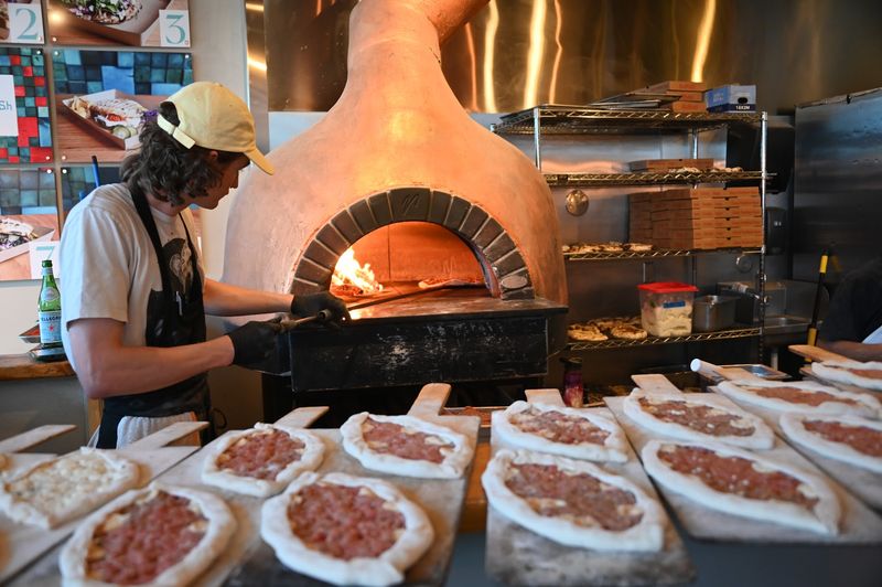 That Copper-Plated Wood-Fired Oven Doing All The Work That Copper-Plated Wood-Fired Oven Doing All The Work