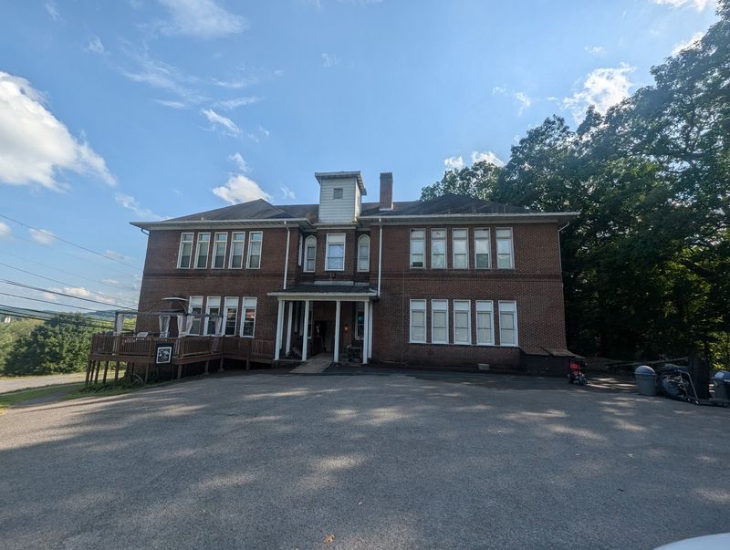 The Brick Schoolhouse That Traded Chalkboards For Pizza Ovens