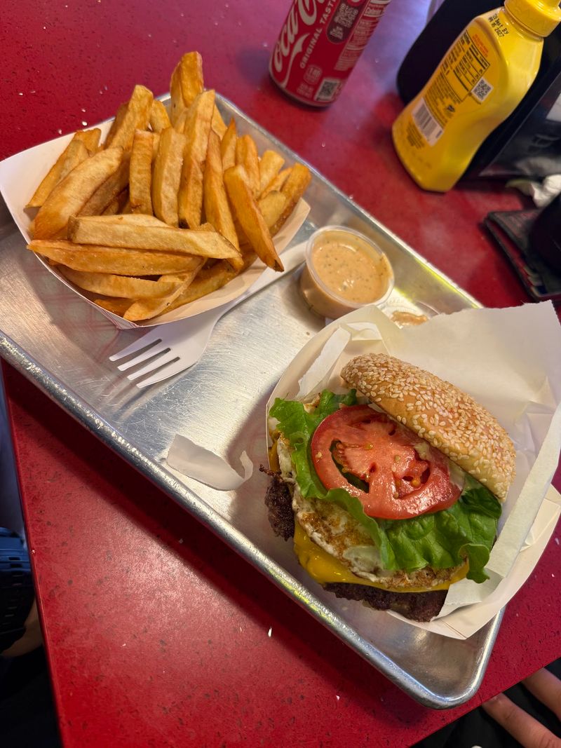 The Classic Cheeseburger On A Toasted Sesame Bun The Classic Cheeseburger On A Toasted Sesame Bun